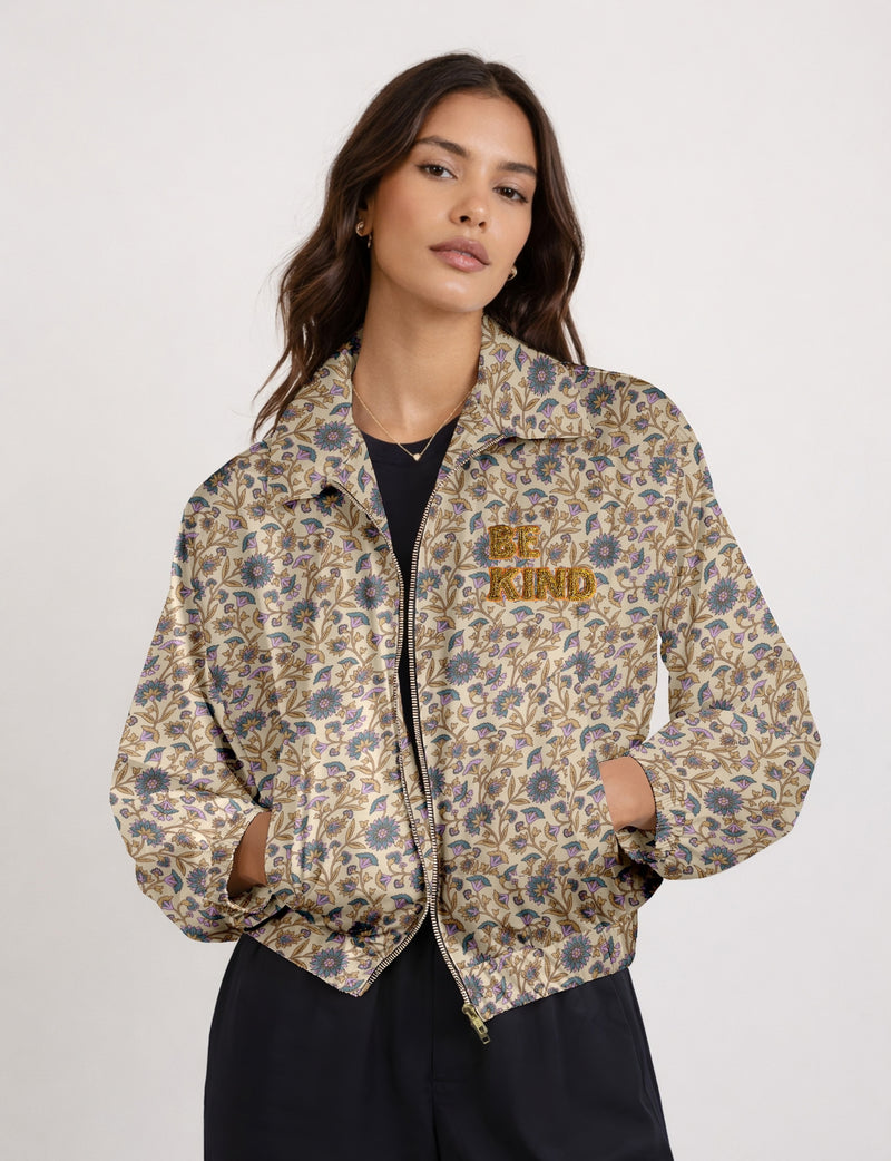 BE KIND Bomber jacket made from upcycled sari fabric with handcrafted Aari embroidery by female artisans.