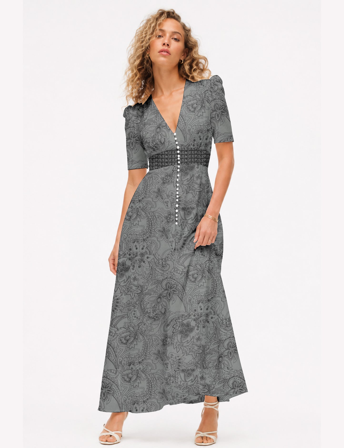 Maxi romantic dress with a fitted bodice, V-neckline, functional button placket, structured waist panel, short sleeves, and a softly flared ankle-length A-line skirt.