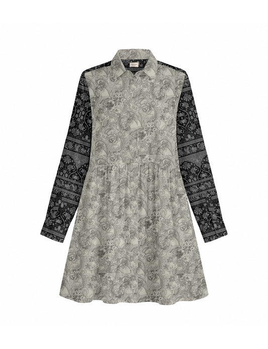 Short shirt dress with a relaxed A-line silhouette, point collar, partial button placket, gathered waist, side pockets, and full-length cuffed sleeves.