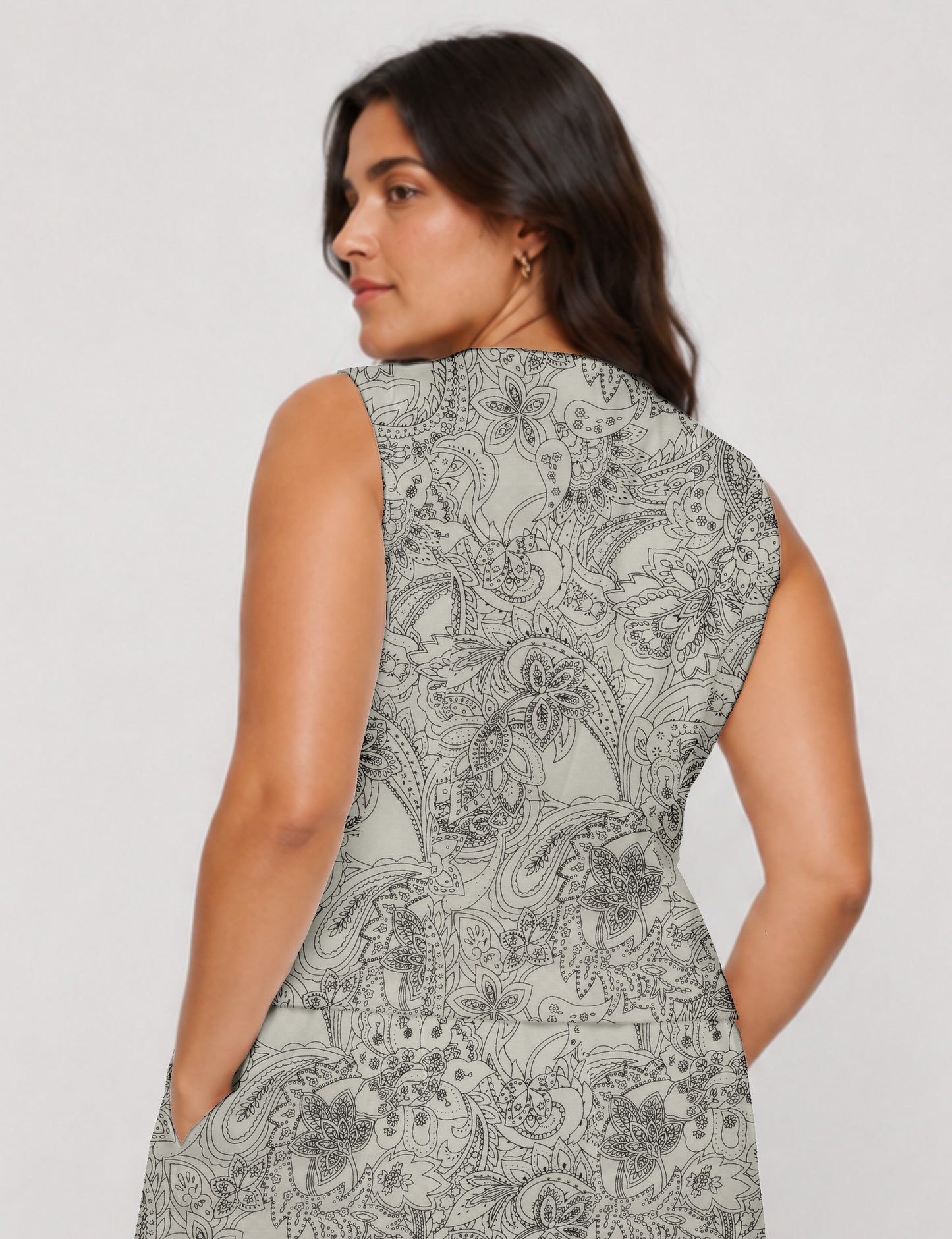 Women's fitted waistcoat with V-neck, single-breasted button closure, tailored silhouette, and pointed hem in sustainable fashion.