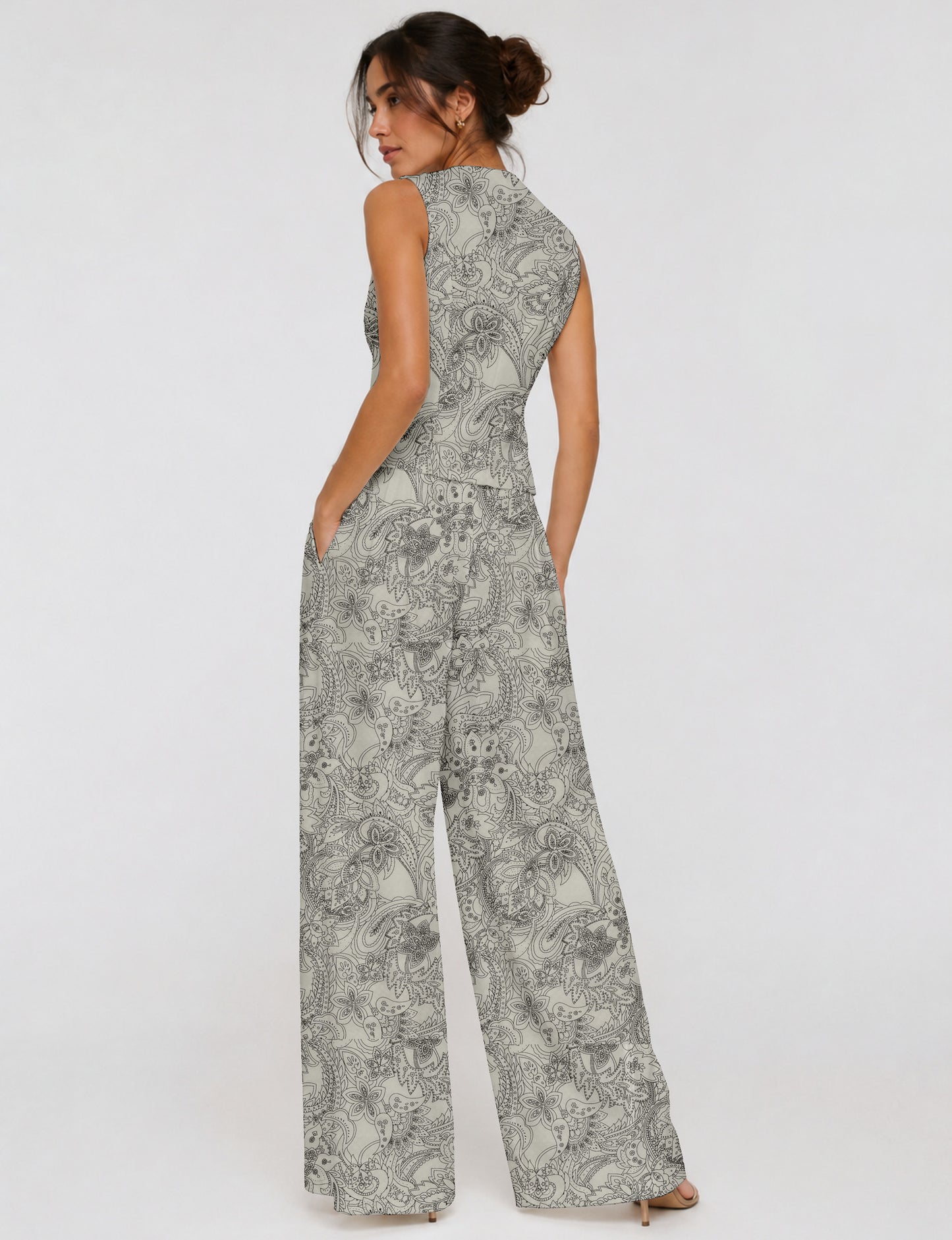Women's tailored waistcoat set with a sleeveless V-neck button-front waistcoat and high-rise wide leg trousers in a coordinated matching outfit.