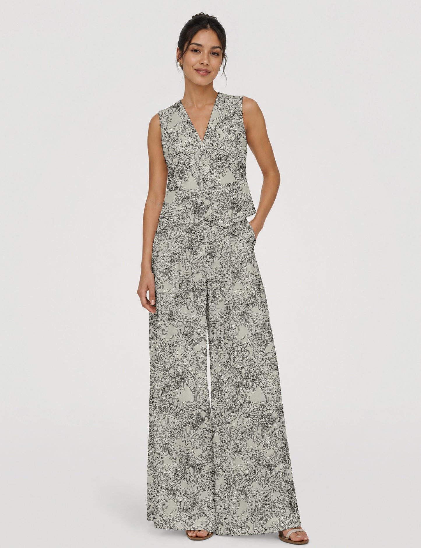Women's tailored waistcoat set with a sleeveless V-neck button-front waistcoat and high-rise wide leg trousers in a coordinated matching outfit.