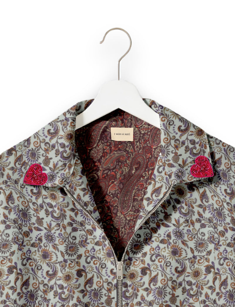 Love Bomber Jacket made from recycled fabric, featuring hand-stitched Aari embroidery. A unique piece of zero-waste clothing, part of the circular fashion movement. Designed with upcycled materials for a stylish yet environmentally friendly clothing choice.
