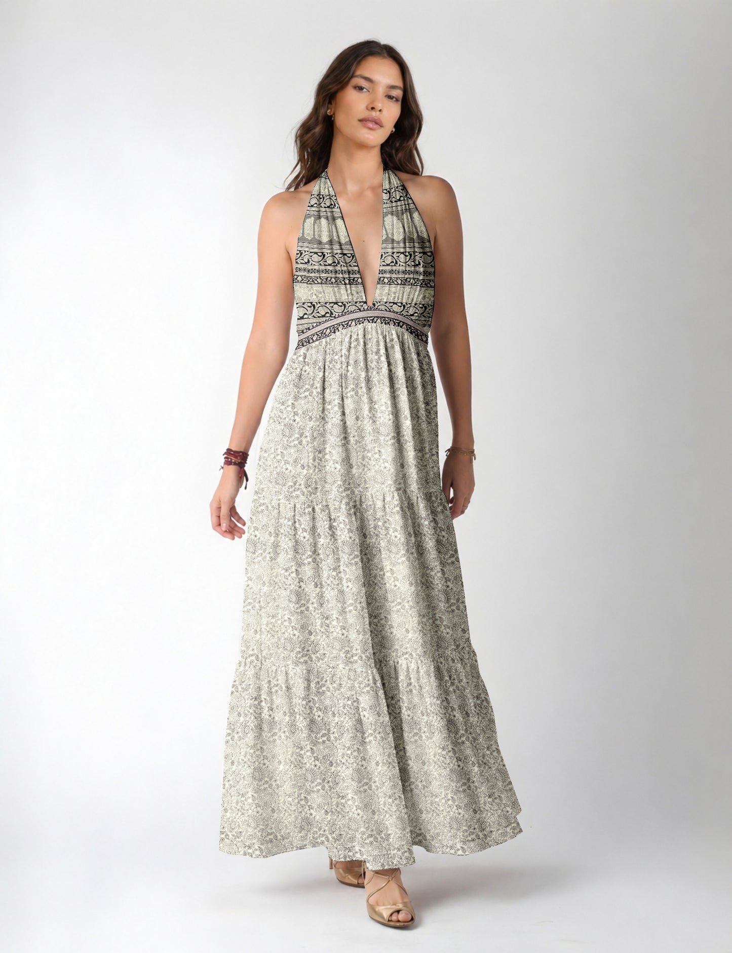 Maxi tiered dress by I was a Sari with halter neckline and flowy silhouette