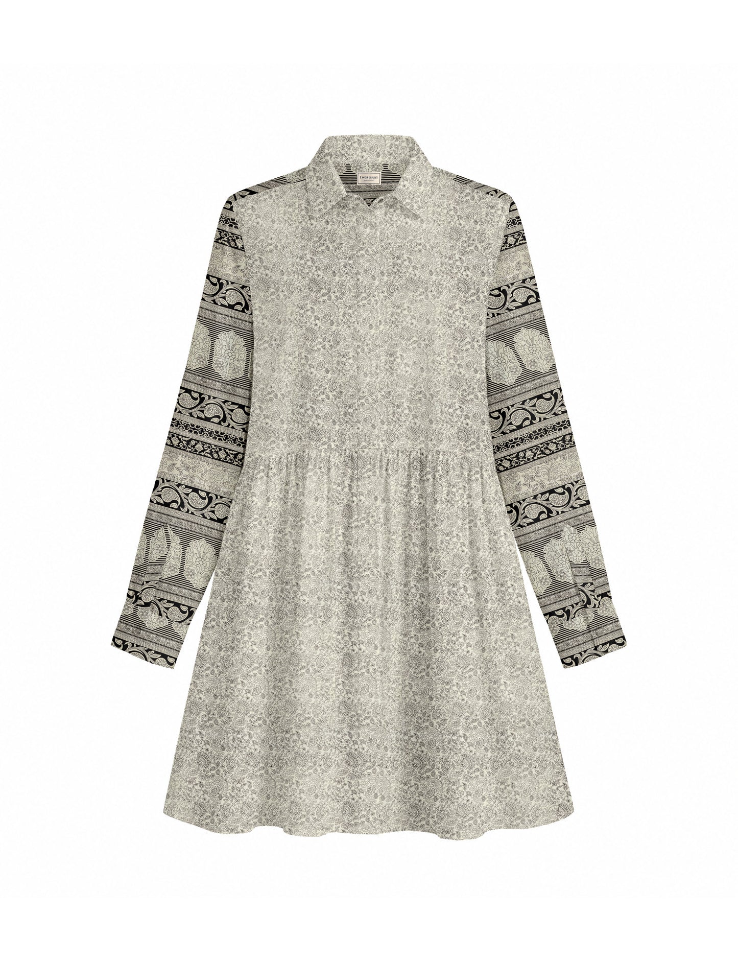 Short shirt dress with a relaxed A-line silhouette, point collar, partial button placket, gathered waist, side pockets, and full-length cuffed sleeves.