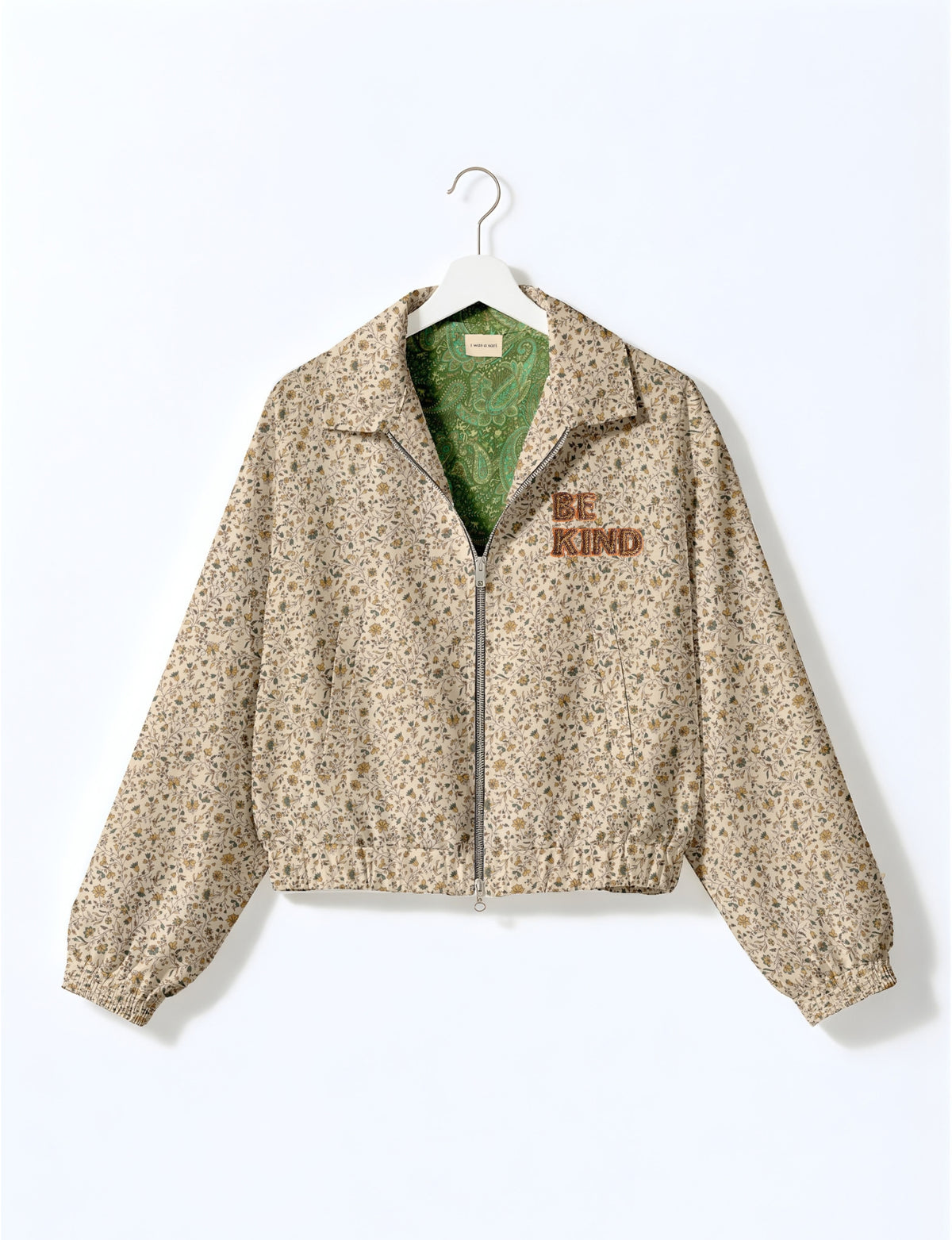 BE KIND Bomber jacket made from upcycled sari fabric with handcrafted Aari embroidery by female artisans.