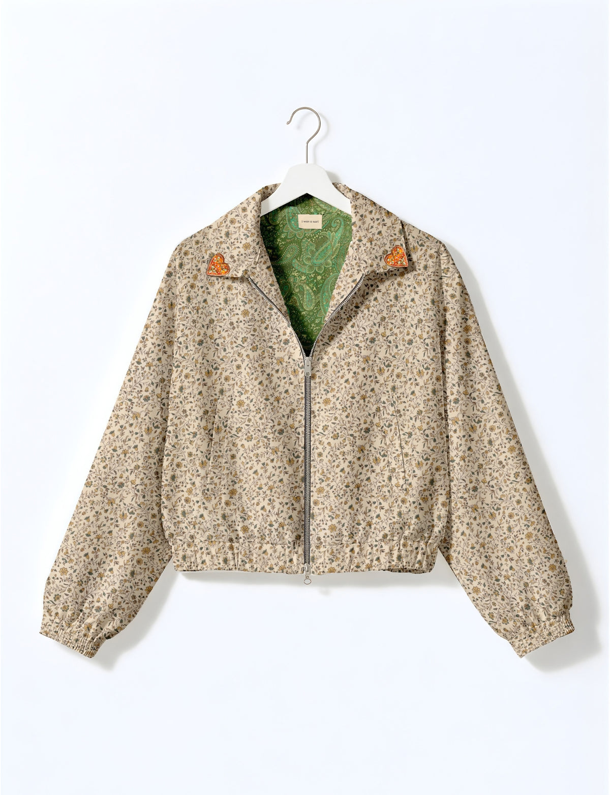 Love Bomber Jacket made from recycled fabric, featuring hand-stitched Aari embroidery. A unique piece of zero-waste clothing, part of the circular fashion movement. Designed with upcycled materials for a stylish yet environmentally friendly clothing choice.