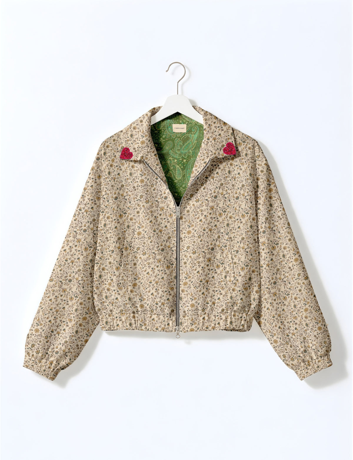 Love Bomber Jacket made from recycled fabric, featuring hand-stitched Aari embroidery. A unique piece of zero-waste clothing, part of the circular fashion movement. Designed with upcycled materials for a stylish yet environmentally friendly clothing choice.
