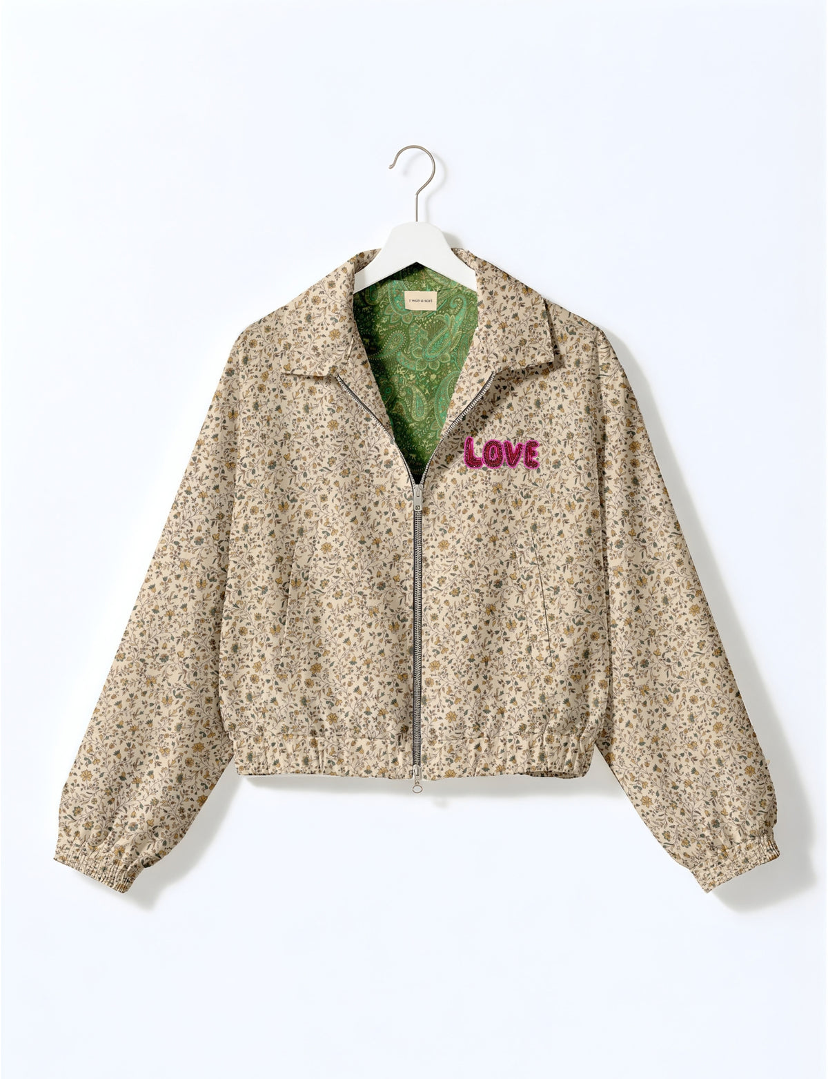 Love Bomber Jacket made from recycled fabric, featuring hand-stitched Aari embroidery. A unique piece of zero-waste clothing, part of the circular fashion movement. Designed with upcycled materials for a stylish yet environmentally friendly clothing choice.
