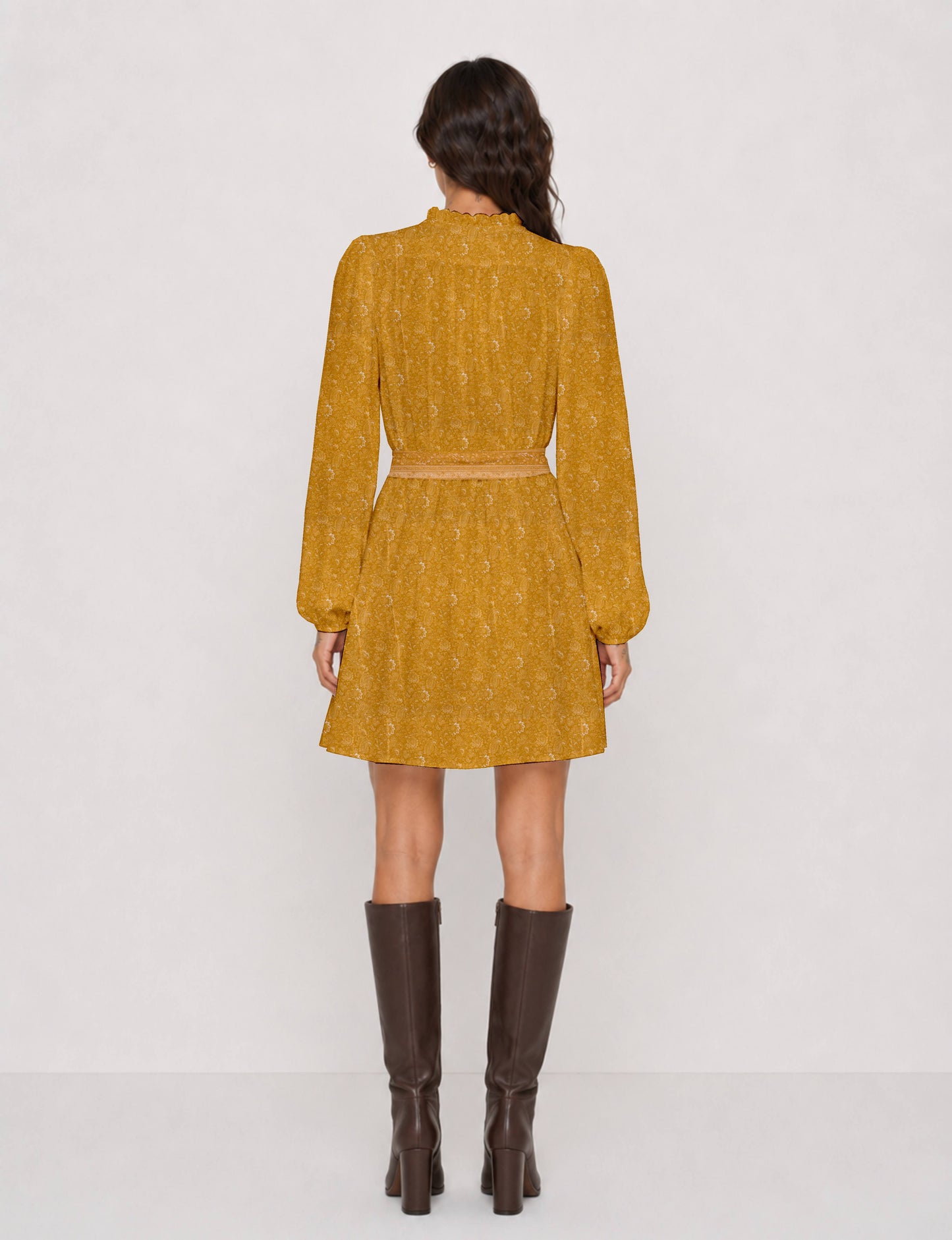 Swing dress with detachable tie belt, gathered ruffle neckline, full-length voluminous sleeves, elastic cuffs, and relaxed A-line silhouette in an above-knee length.