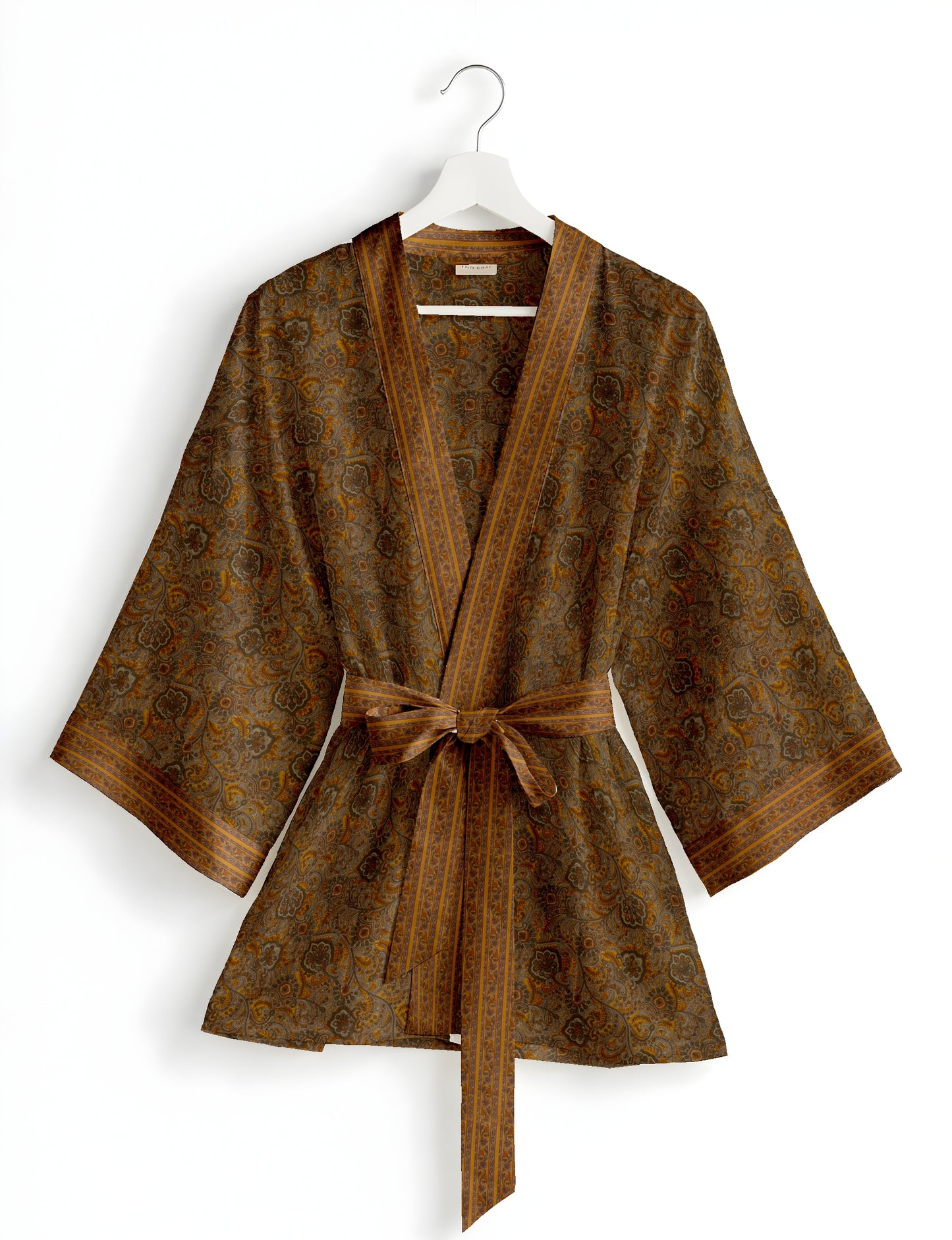 Short kimono robe with wrap front, V-neckline, wide sleeves, waist tie, and concealed skort detail.