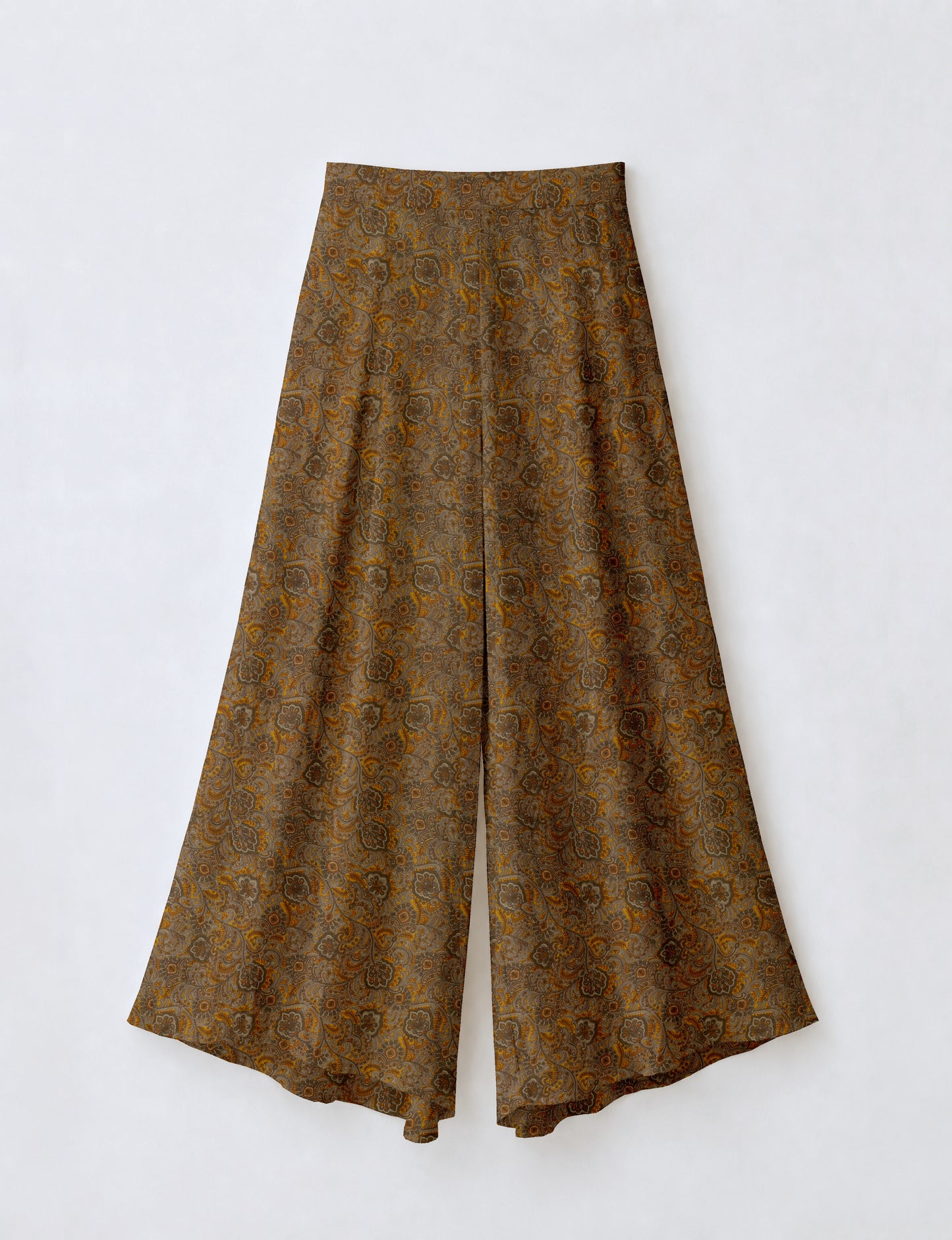 Women's wide leg palazzo trousers with a fitted waistband and relaxed flowing silhouette.