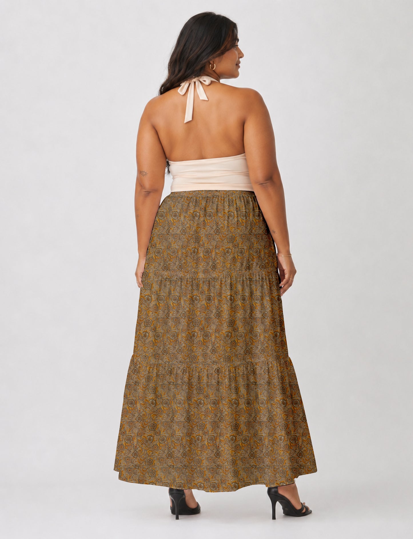 Yellow midi tiered skirt with small dark geometric micro pattern, flat lay front view