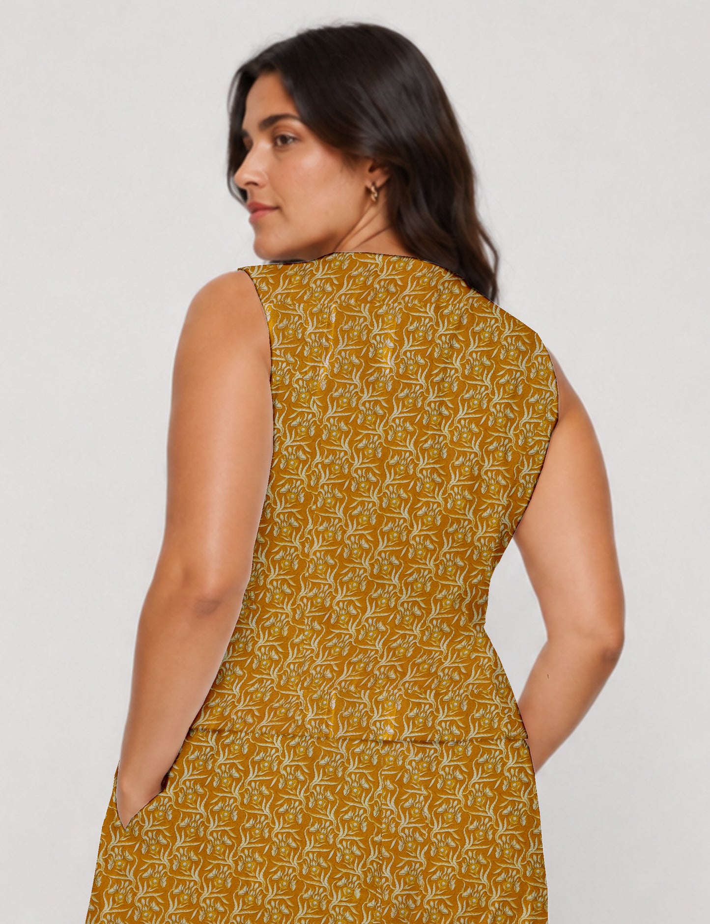 Women's fitted waistcoat with V-neck, single-breasted button closure, tailored silhouette, and pointed hem in sustainable fashion.