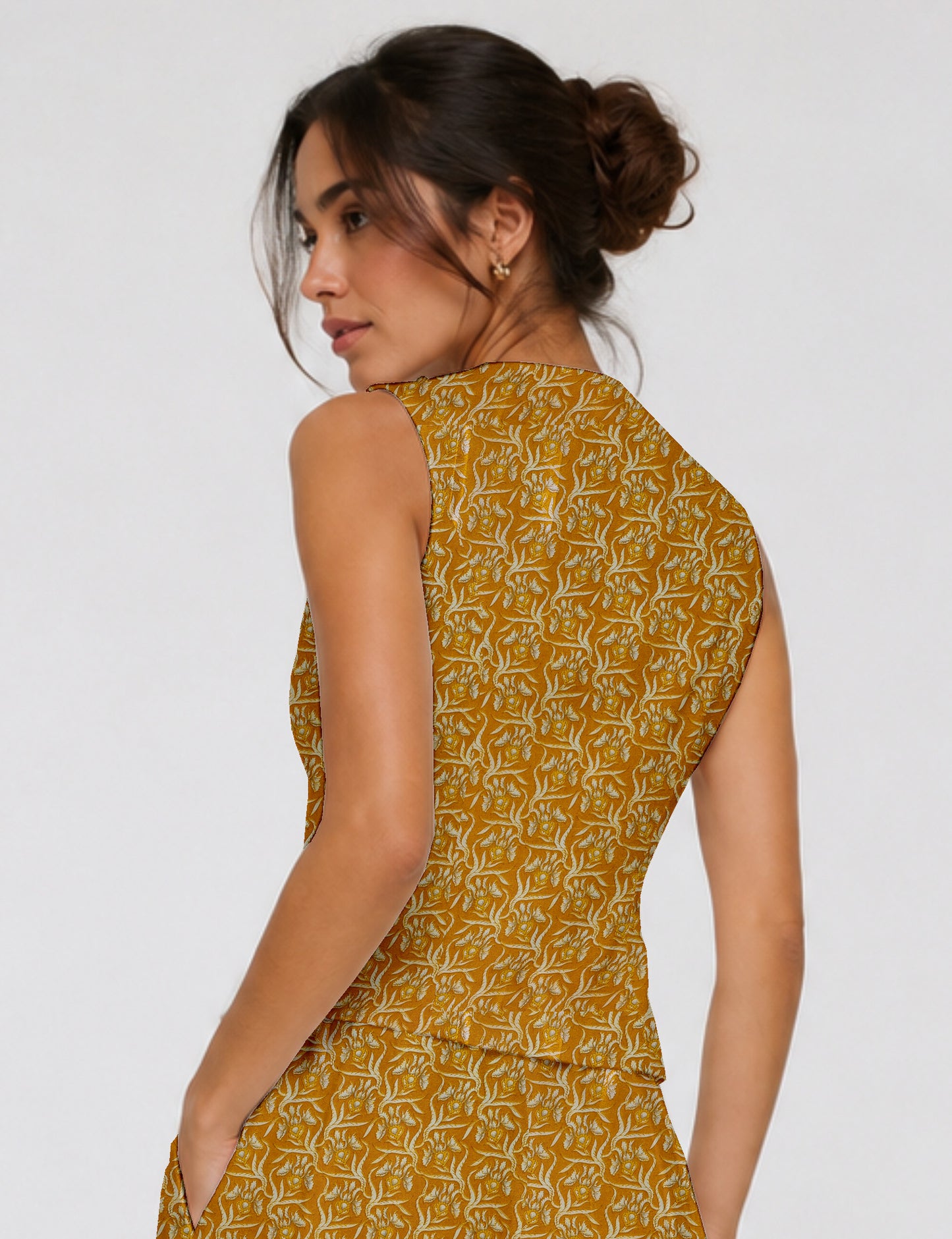 Women's fitted waistcoat with V-neck, single-breasted button closure, tailored silhouette, and pointed hem in sustainable fashion.
