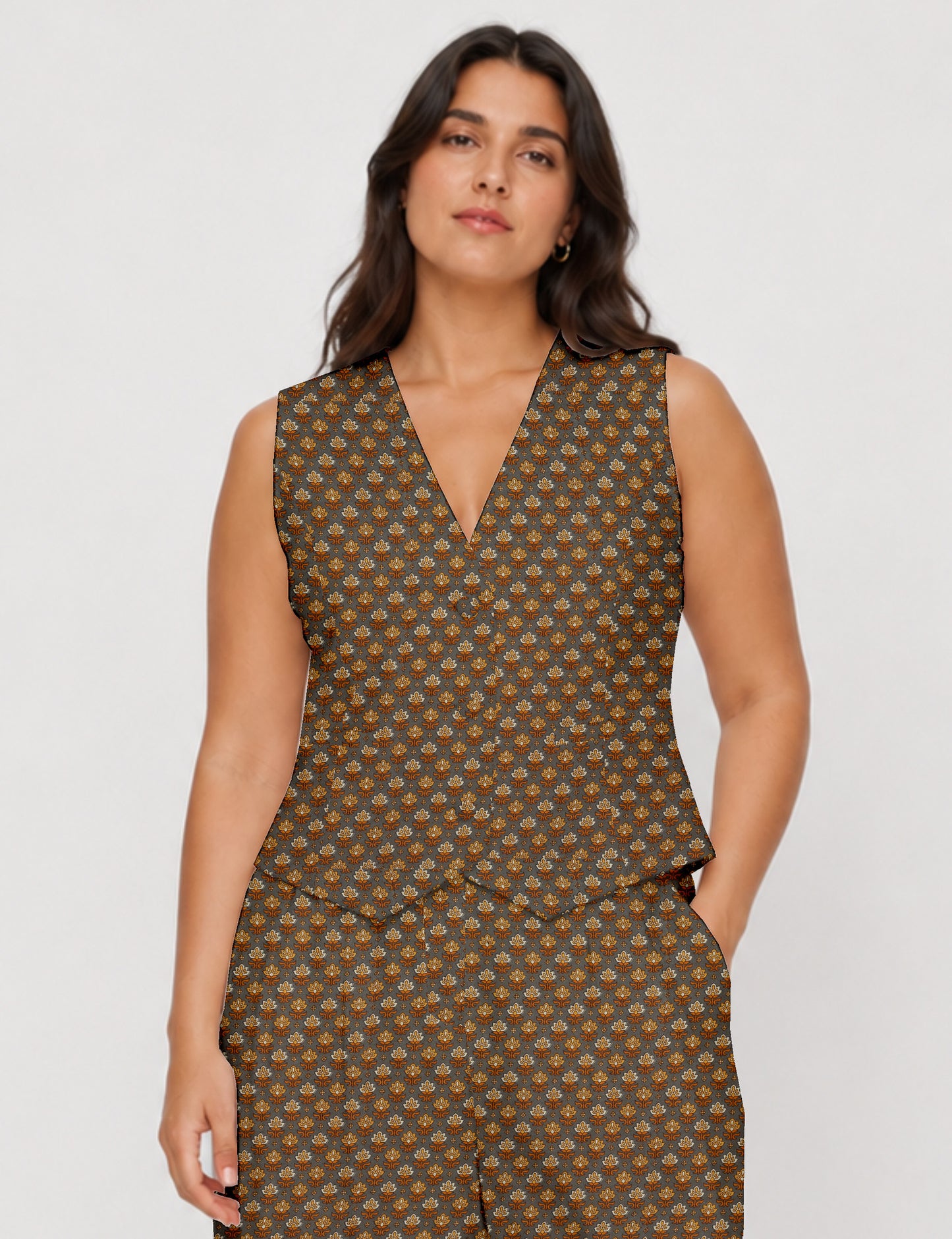 Women's fitted waistcoat with V-neck, single-breasted button closure, tailored silhouette, and pointed hem in sustainable fashion.