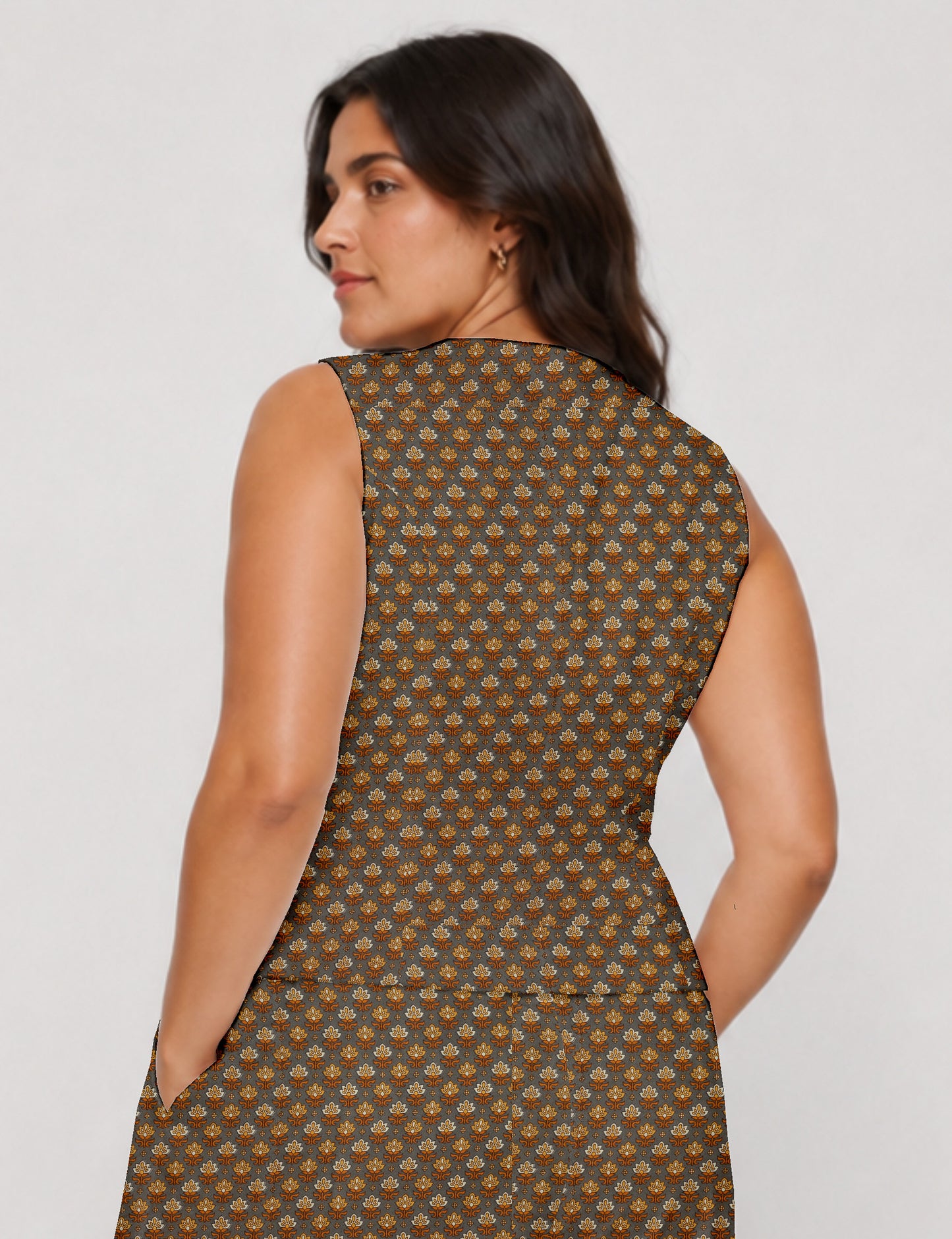 Women's fitted waistcoat with V-neck, single-breasted button closure, tailored silhouette, and pointed hem in sustainable fashion.