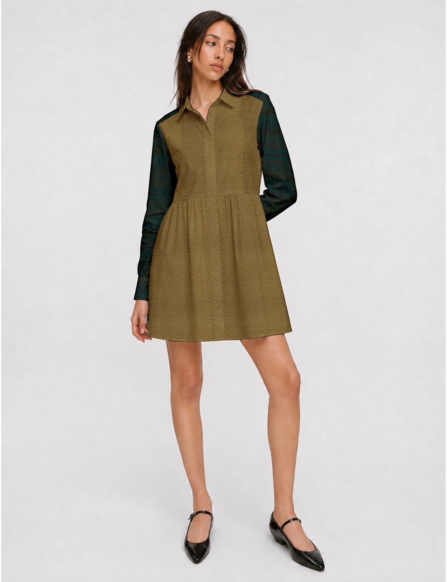 Short shirt dress with a relaxed A-line silhouette, point collar, partial button placket, gathered waist, side pockets, and full-length cuffed sleeves.