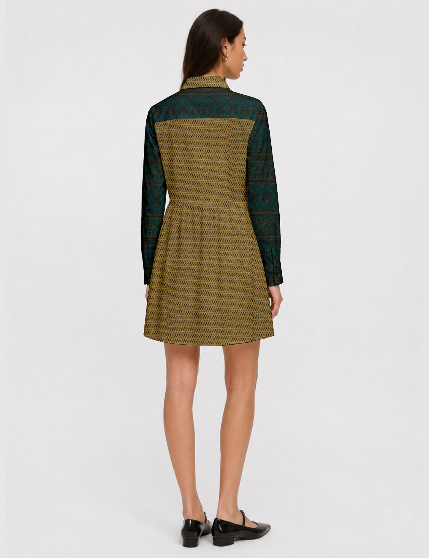 Short shirt dress with a relaxed A-line silhouette, point collar, partial button placket, gathered waist, side pockets, and full-length cuffed sleeves.
