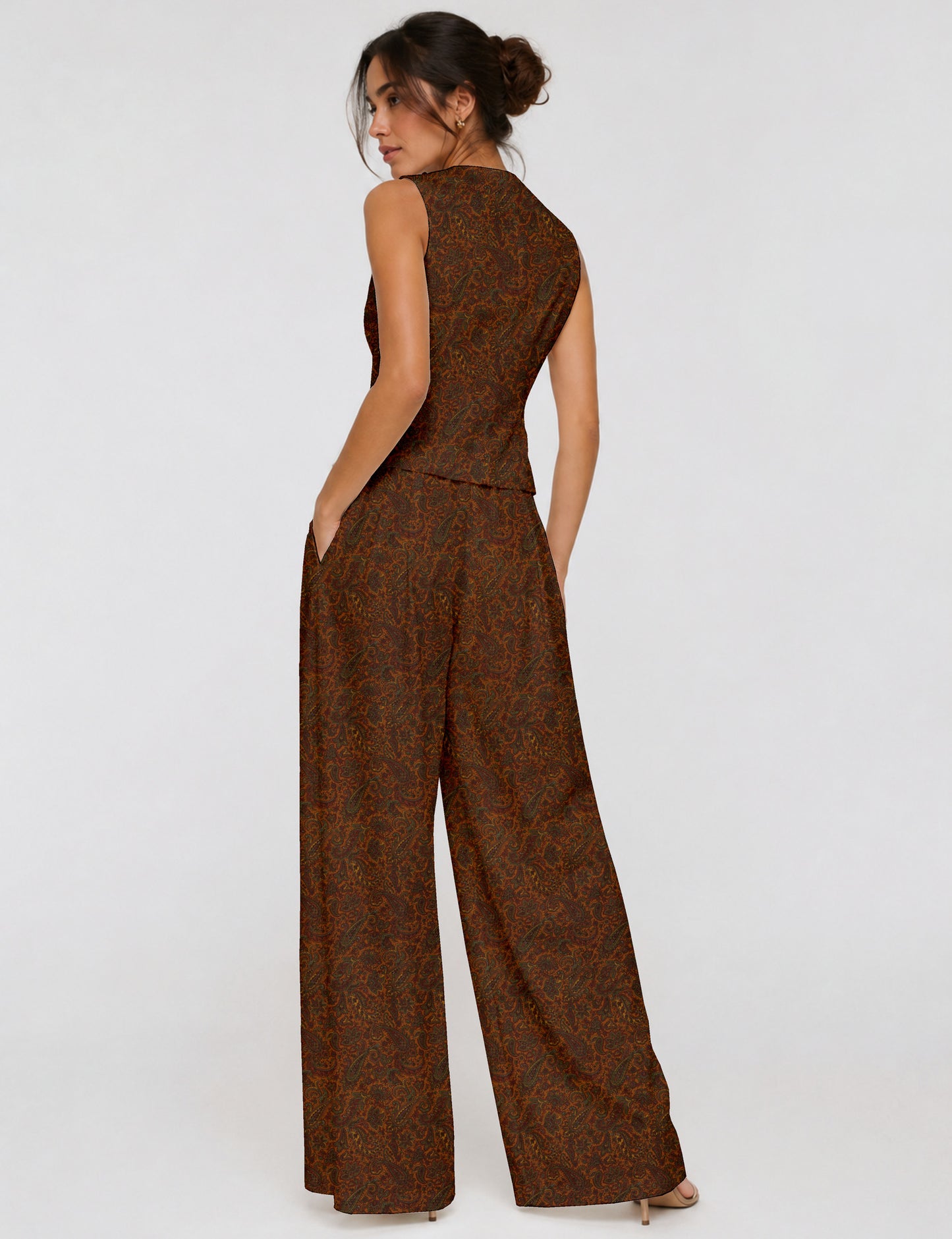 Women's tailored waistcoat set with a sleeveless V-neck button-front waistcoat and high-rise wide leg trousers in a coordinated matching outfit.