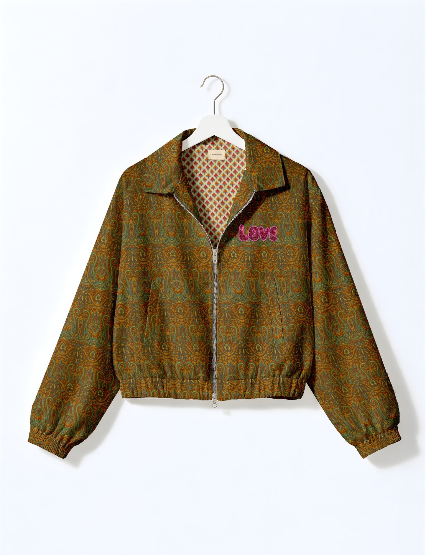 Love Bomber Jacket made from recycled fabric, featuring hand-stitched Aari embroidery. A unique piece of zero-waste clothing, part of the circular fashion movement. Designed with upcycled materials for a stylish yet environmentally friendly clothing choice.