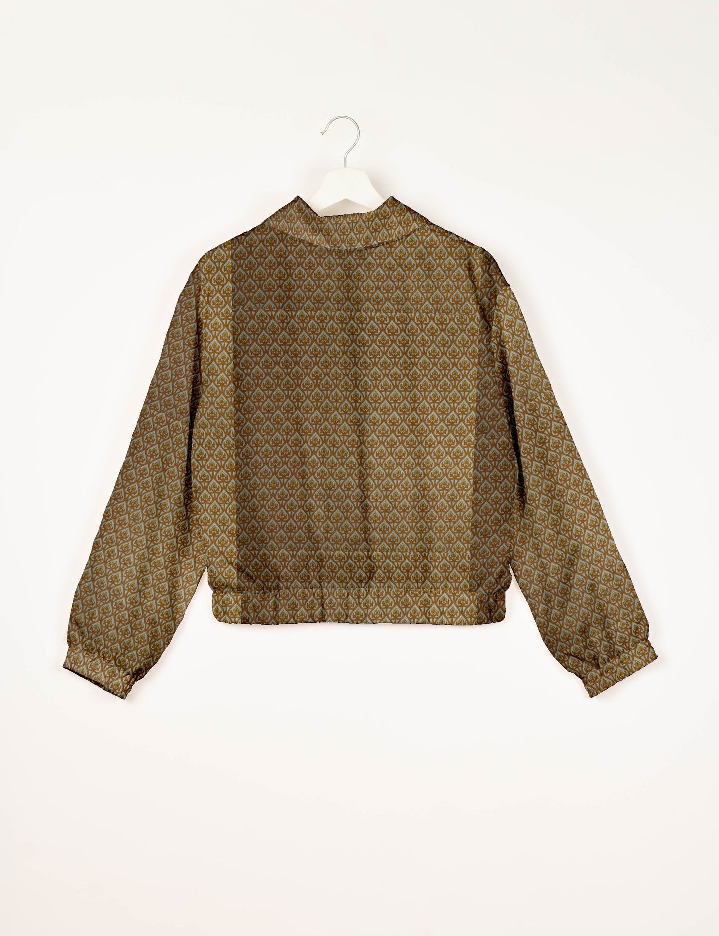 Upcycled Bomber Jacket made from recycled sari materials, featuring a cute cropped shape, elasticated hem and cuffs, and contrast sari print lining. Sustainable apparel promoting eco-friendly fashion and ethical clothing.