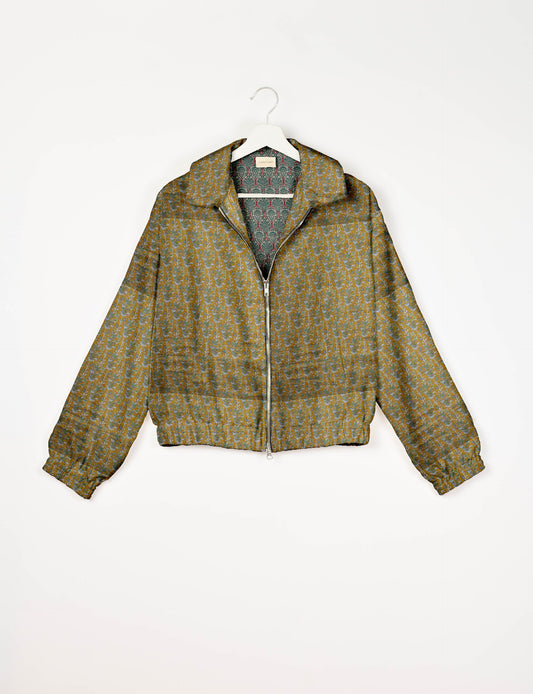 Upcycled Bomber Jacket made from recycled sari materials, featuring a cute cropped shape, elasticated hem and cuffs, and contrast sari print lining. Sustainable apparel promoting eco-friendly fashion and ethical clothing.