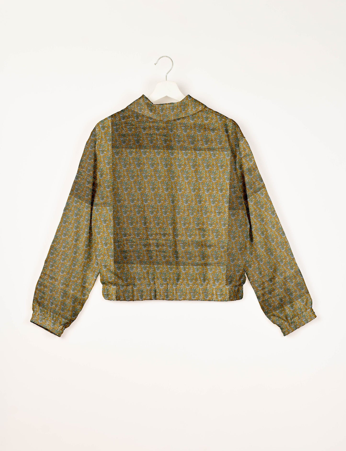 Upcycled Bomber Jacket made from recycled sari materials, featuring a cute cropped shape, elasticated hem and cuffs, and contrast sari print lining. Sustainable apparel promoting eco-friendly fashion and ethical clothing.