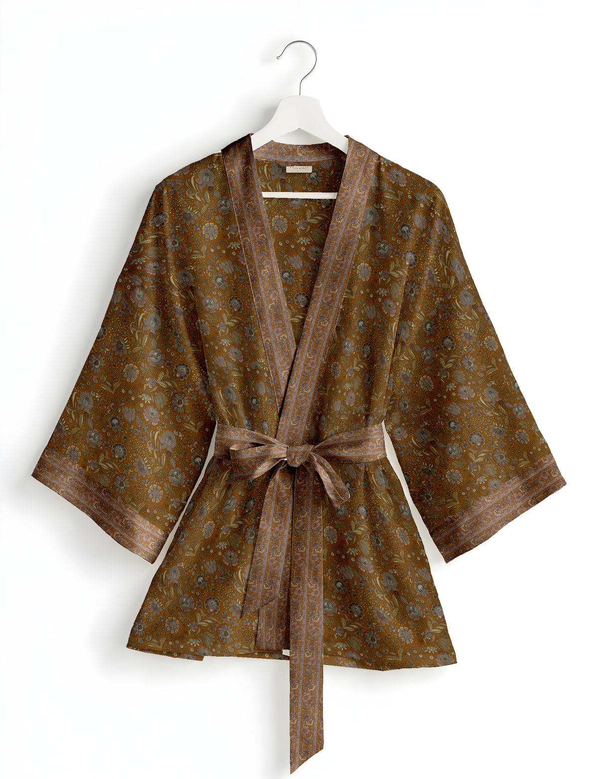 Short kimono robe in brown with floral pattern, wide sleeves, border trim, and self-tie belt, hanging on white hanger