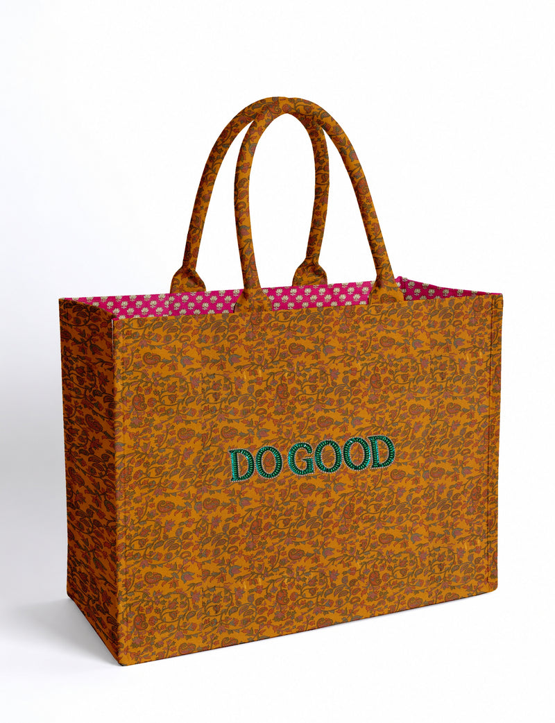 Structured DO GOOD work tote bag featuring embroidered appliqué lettering on the front, double padded shoulder handles and an internal zippered pocket.