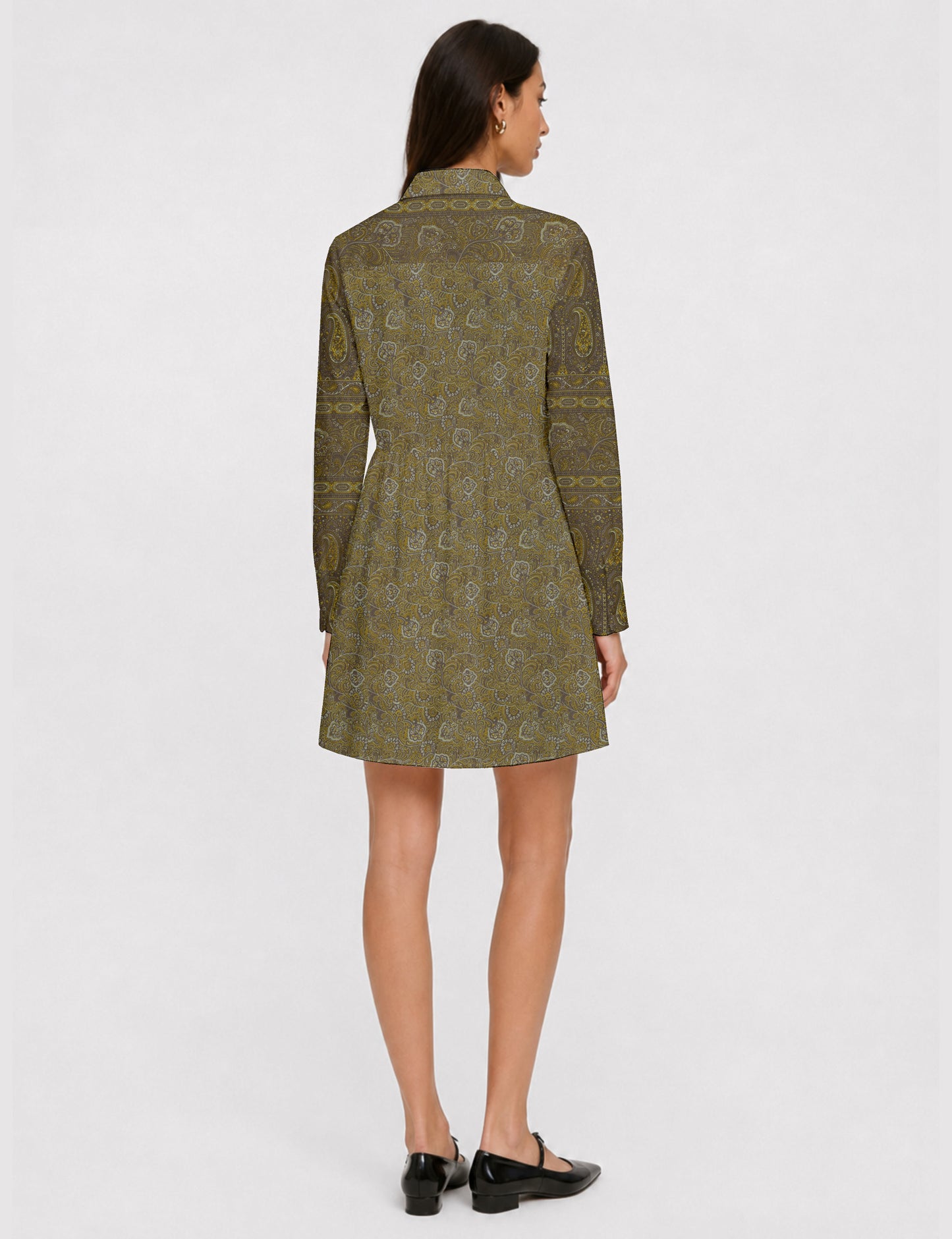 Short shirt dress with a relaxed A-line silhouette, point collar, partial button placket, gathered waist, side pockets, and full-length cuffed sleeves.