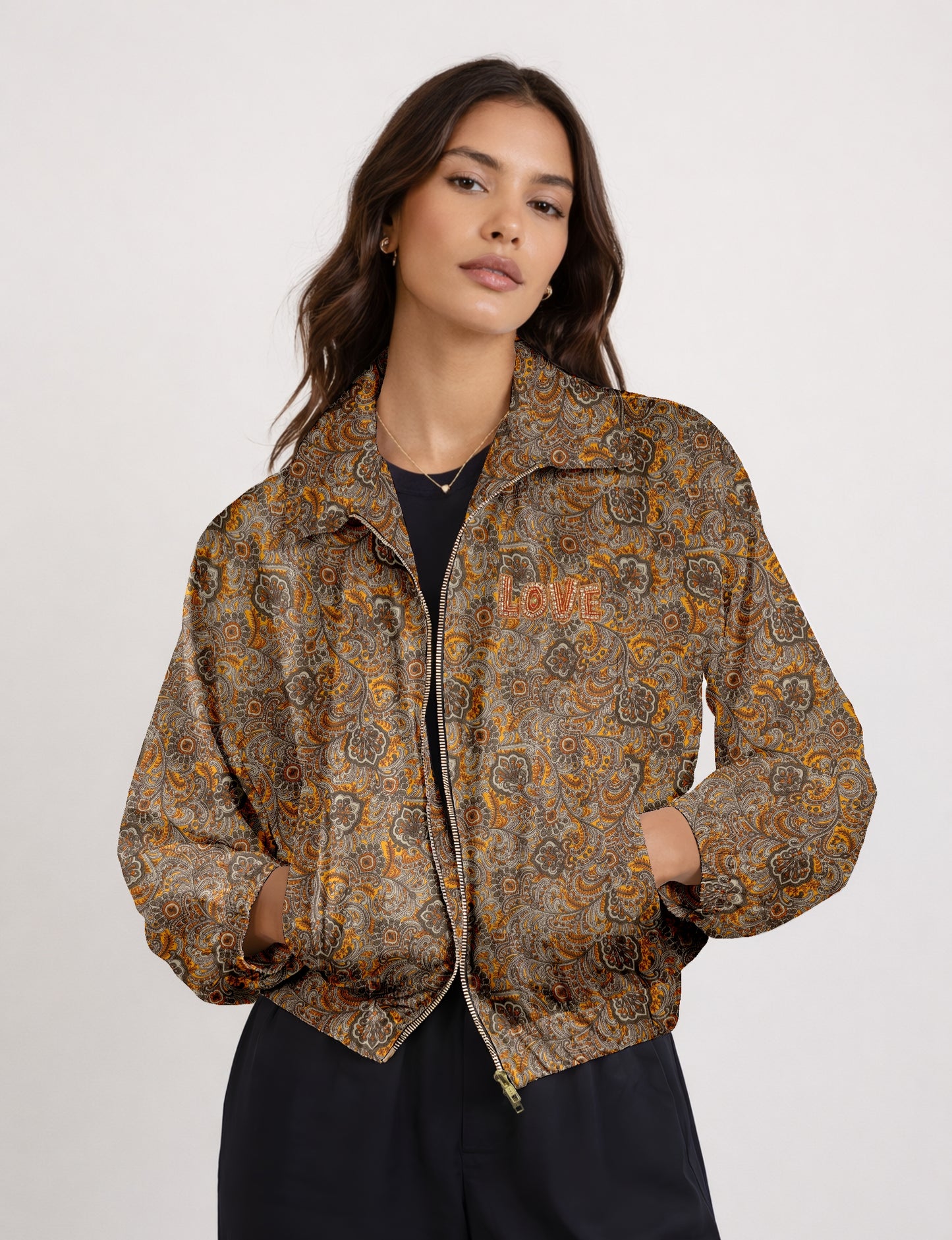 Love Bomber Jacket made from recycled fabric, featuring hand-stitched Aari embroidery. A unique piece of zero-waste clothing, part of the circular fashion movement. Designed with upcycled materials for a stylish yet environmentally friendly clothing choice.