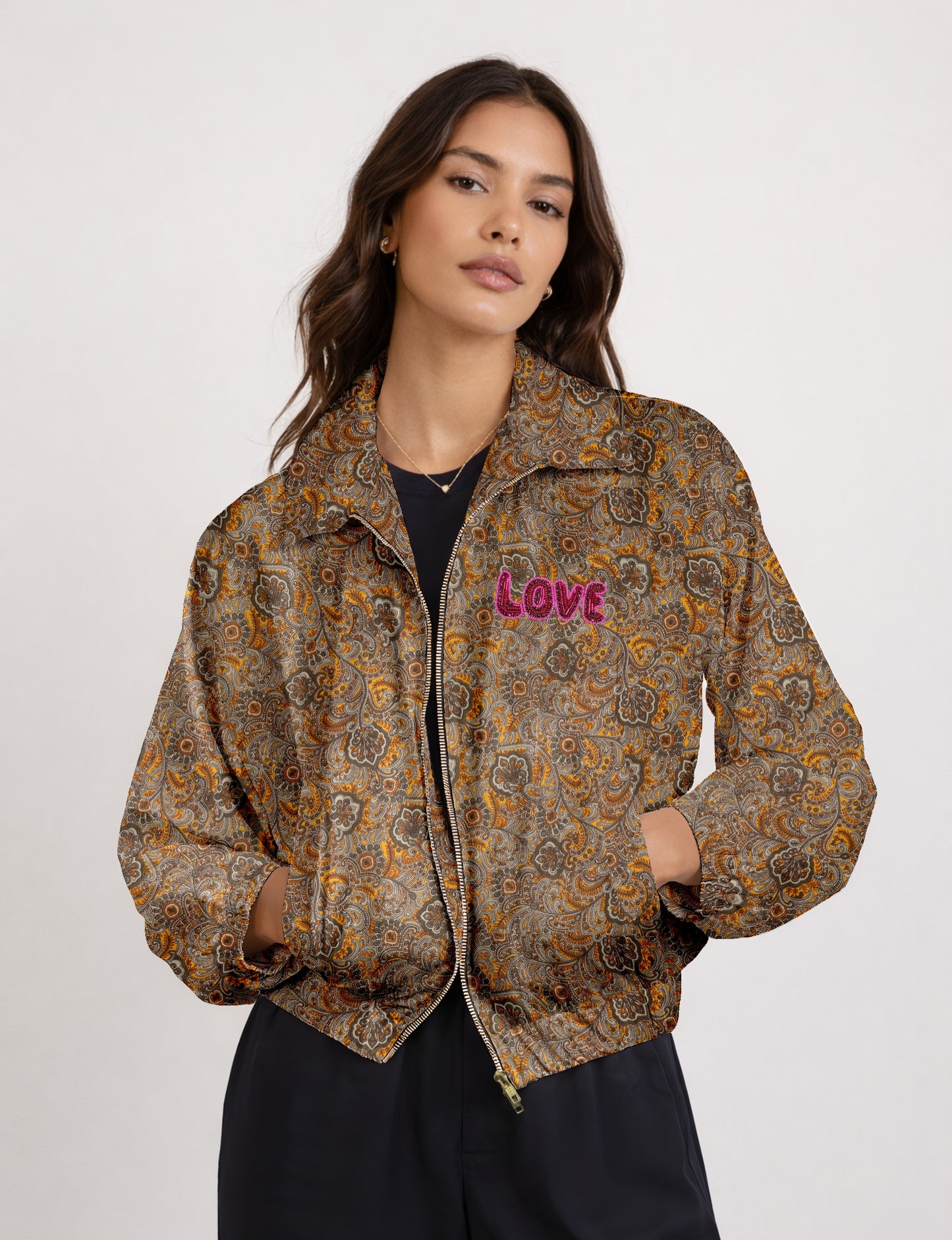 Love Bomber Jacket made from recycled fabric, featuring hand-stitched Aari embroidery. A unique piece of zero-waste clothing, part of the circular fashion movement. Designed with upcycled materials for a stylish yet environmentally friendly clothing choice.