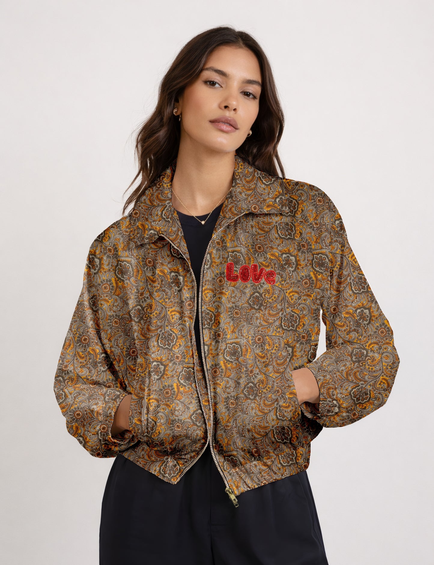 Love Bomber Jacket made from recycled fabric, featuring hand-stitched Aari embroidery. A unique piece of zero-waste clothing, part of the circular fashion movement. Designed with upcycled materials for a stylish yet environmentally friendly clothing choice.