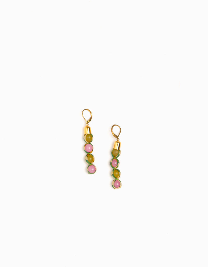 Experience the allure of Beaded Dangler Earrings, a fusion of recycled glass beads and pre-loved sari fabric. Skin-friendly with hypoallergenic hooks, these earrings bring a touch of sustainability to your accessory collection.