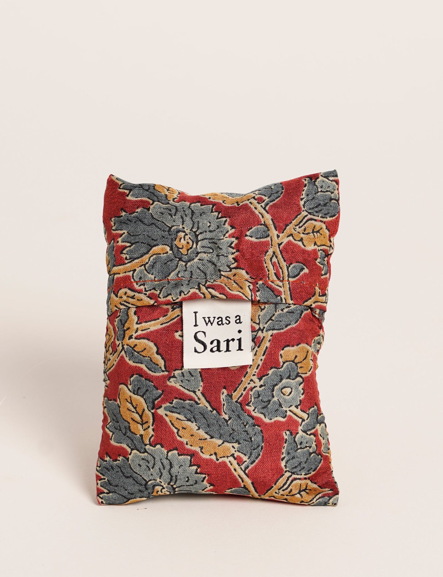 Stay eco-conscious with our Reusable Bag, handmade by Indian artisans from pre-loved saris. Silky and lightweight, this foldaway bag is perfect for your on-the-go lifestyle. Each piece is a unique statement of ethical fashion, embracing sustainability and style.