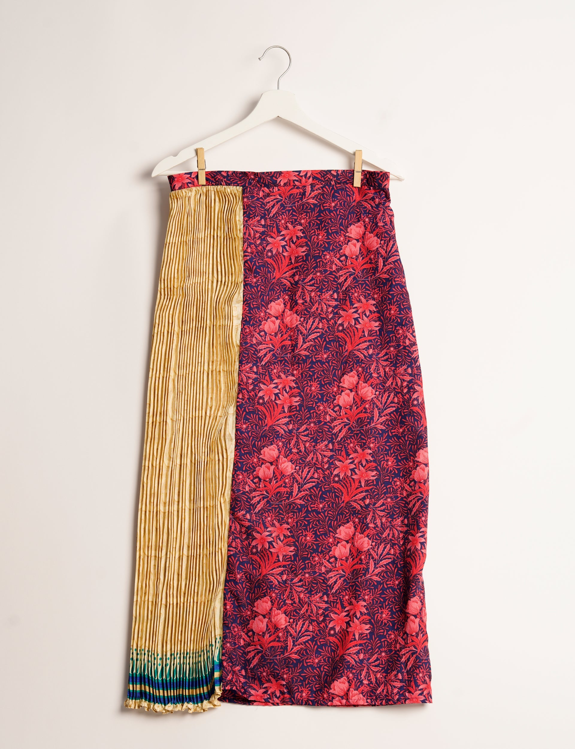 Elevate your wardrobe with the Semi Pleated A-Line Skirt, a sustainable fashion statement. Unique prints, a mix of fabrics, and intricate knife pleats create an individualized, upscale day-to-night look. Crafted with ethical and green fashion values, this skirt represents the essence of eco-friendly style.