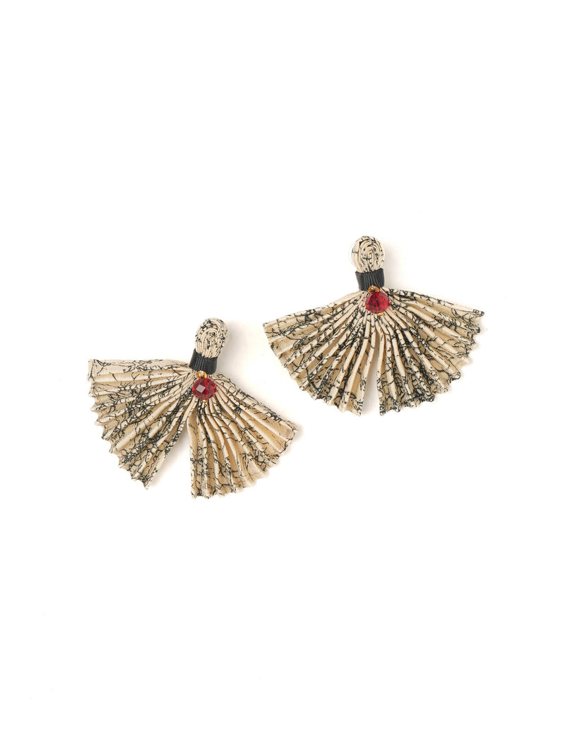 Beige pleated fabric earrings with black floral print, black band, and red gem detail, shown flat on white background