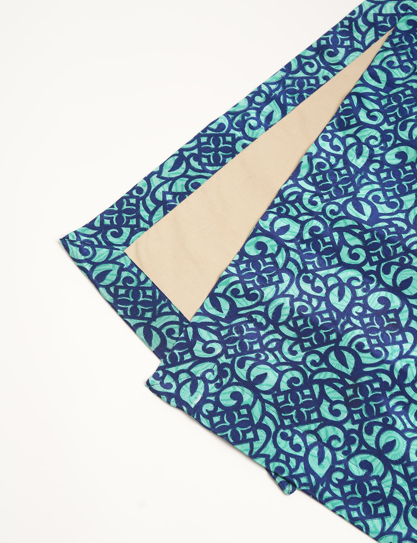 Crafted with care, our 160x40 cm reversible table runner is a blend of 100% cotton canvas and upcycled sari fabric. Ethical, green, and designed for sustainability, this piece adds a unique touch to your dining setup, sparking conversations about eco-friendly living.