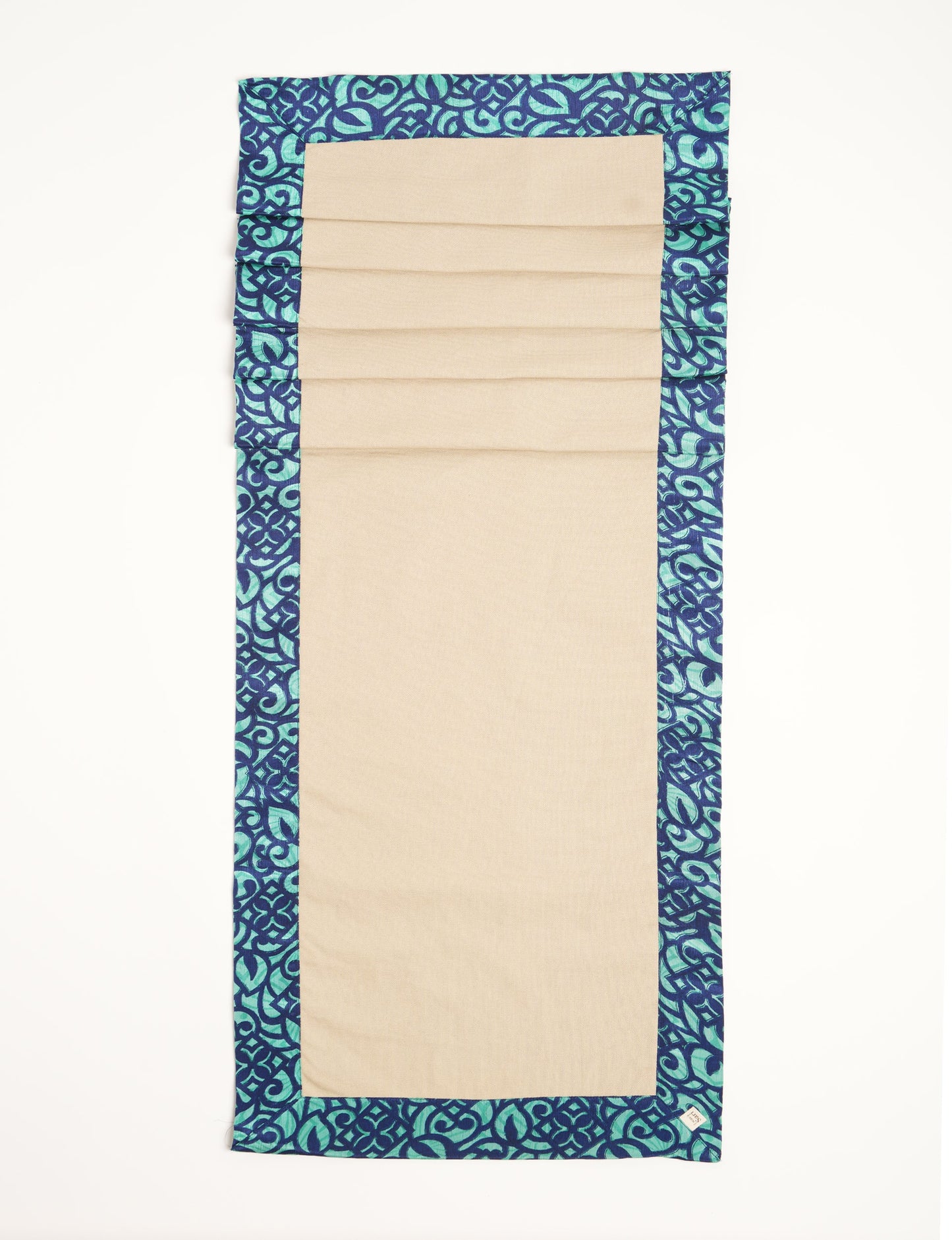 Crafted with care, our 160x40 cm reversible table runner is a blend of 100% cotton canvas and upcycled sari fabric. Ethical, green, and designed for sustainability, this piece adds a unique touch to your dining setup, sparking conversations about eco-friendly living.