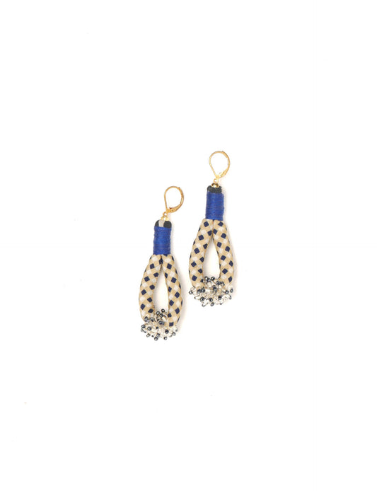 Discover the charm of Beaded Drop Earrings, meticulously crafted by Indian artisans. Recycled cotton rope, sari fabric, and surplus glass beads create an eco-friendly masterpiece. Hypoallergenic metal hooks ensure both style and comfort.